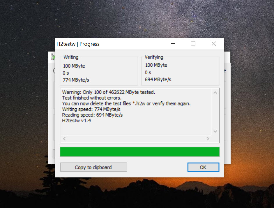 Test results screen showing read and write speed and capacity report